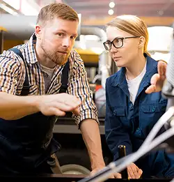 two people explaining something