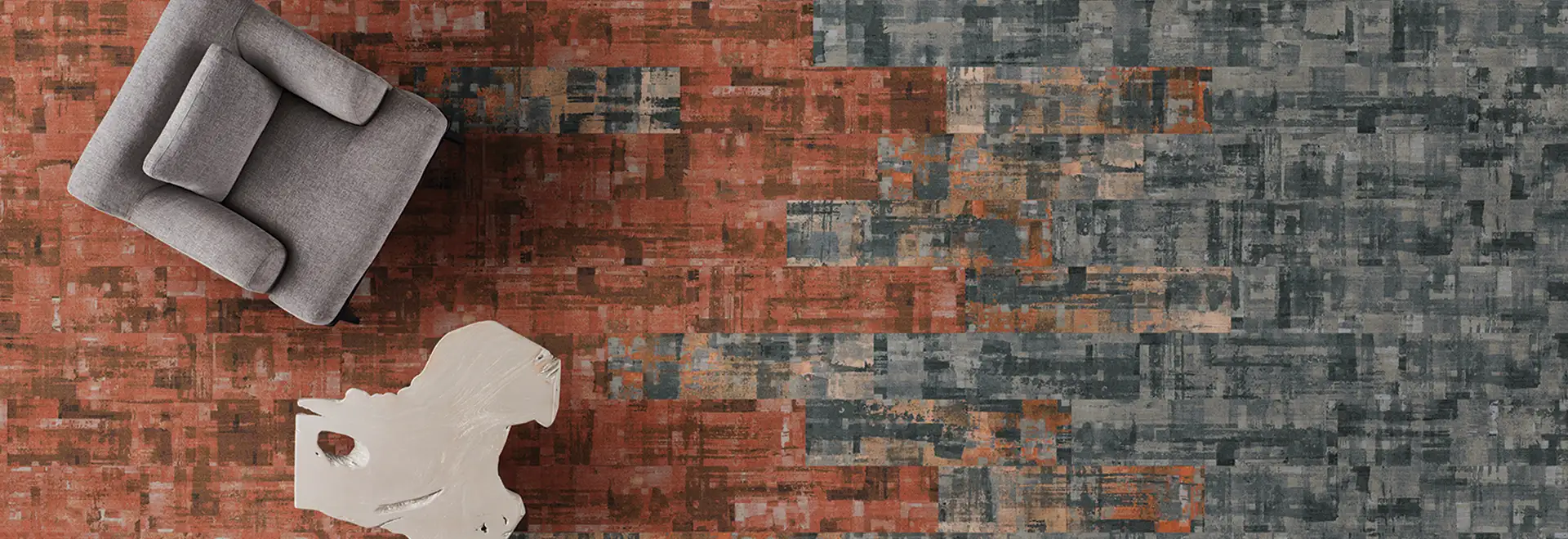 aerial view of plank carpet tile installation  transitioning from tara cotta to gray