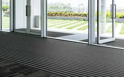 glass vestibule with OBEX Bar flooring