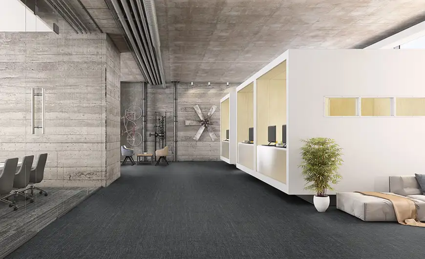 public space with concrete walls and Milliken flooring