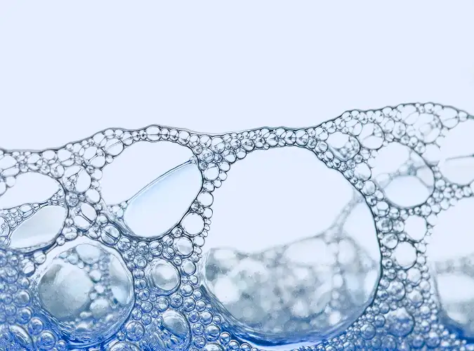 close shot of bubbles on whit background