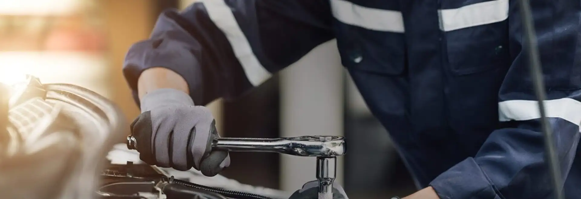 car mechanic waering Milliken workwear apparel