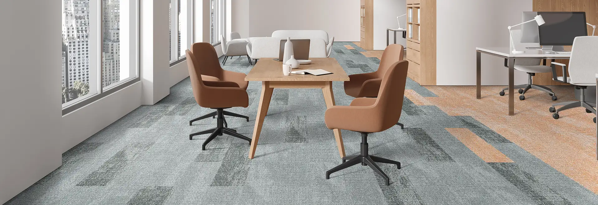 modern confernce room with plank carpet transtioning from blue to tan