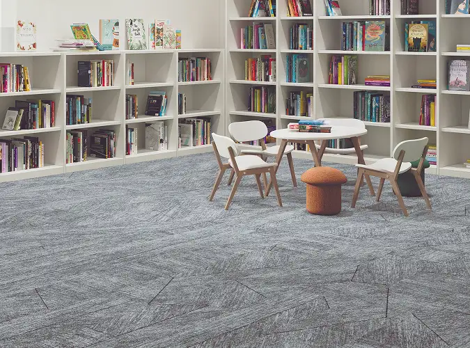 library with Breaking Ground flooring