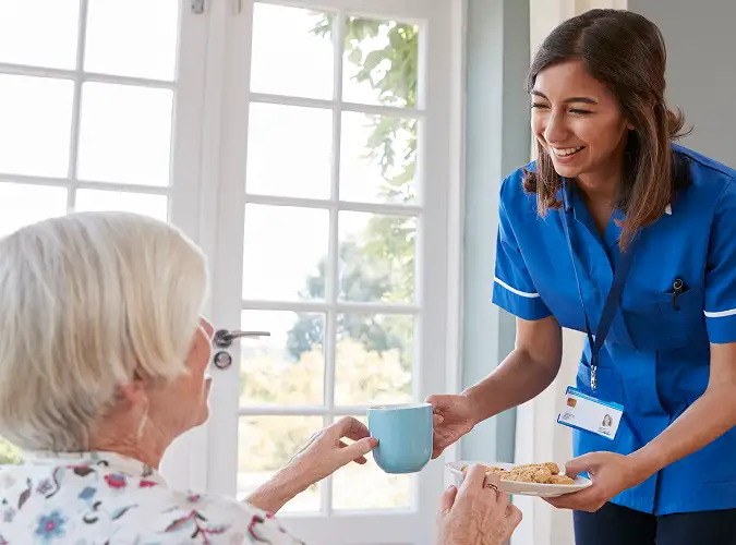 Healthcare professional with smiling patient