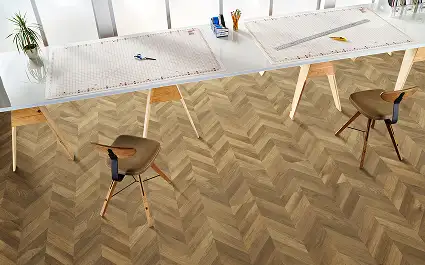drafting table and chairs on herrigbone intalled LVT flooring