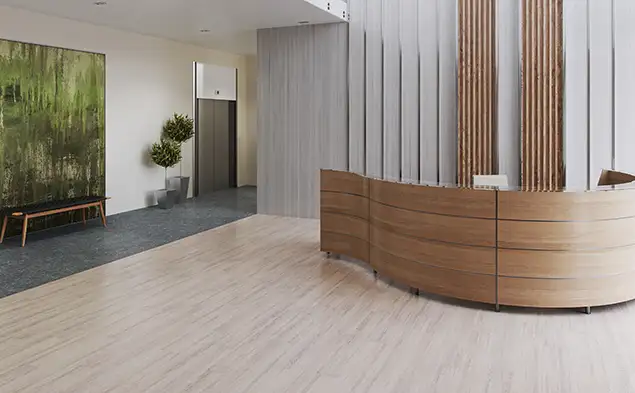 reception area with modern curved desk on Merge Forward LVT flooring
